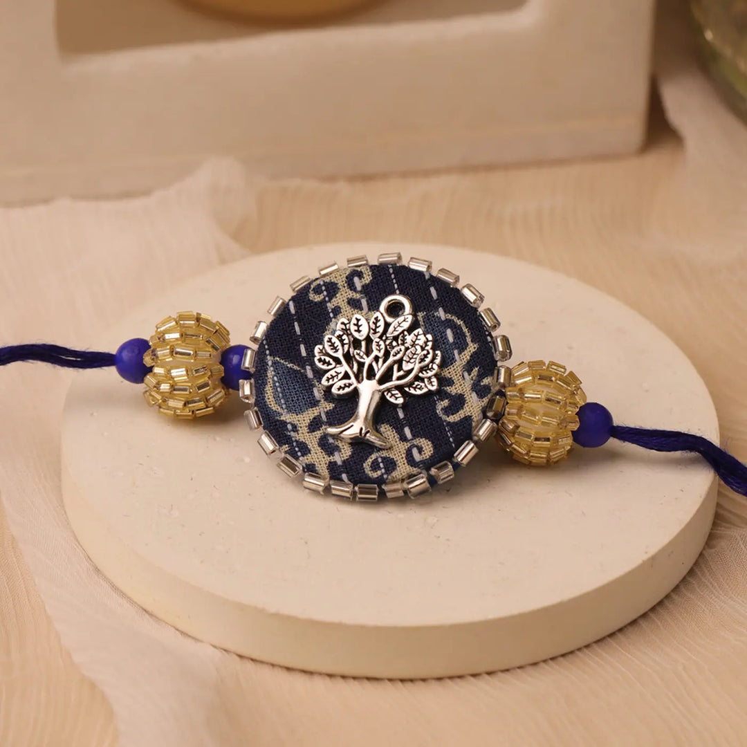 Handmade Blue Tree Of Life Rakhi With Roli Chawal
