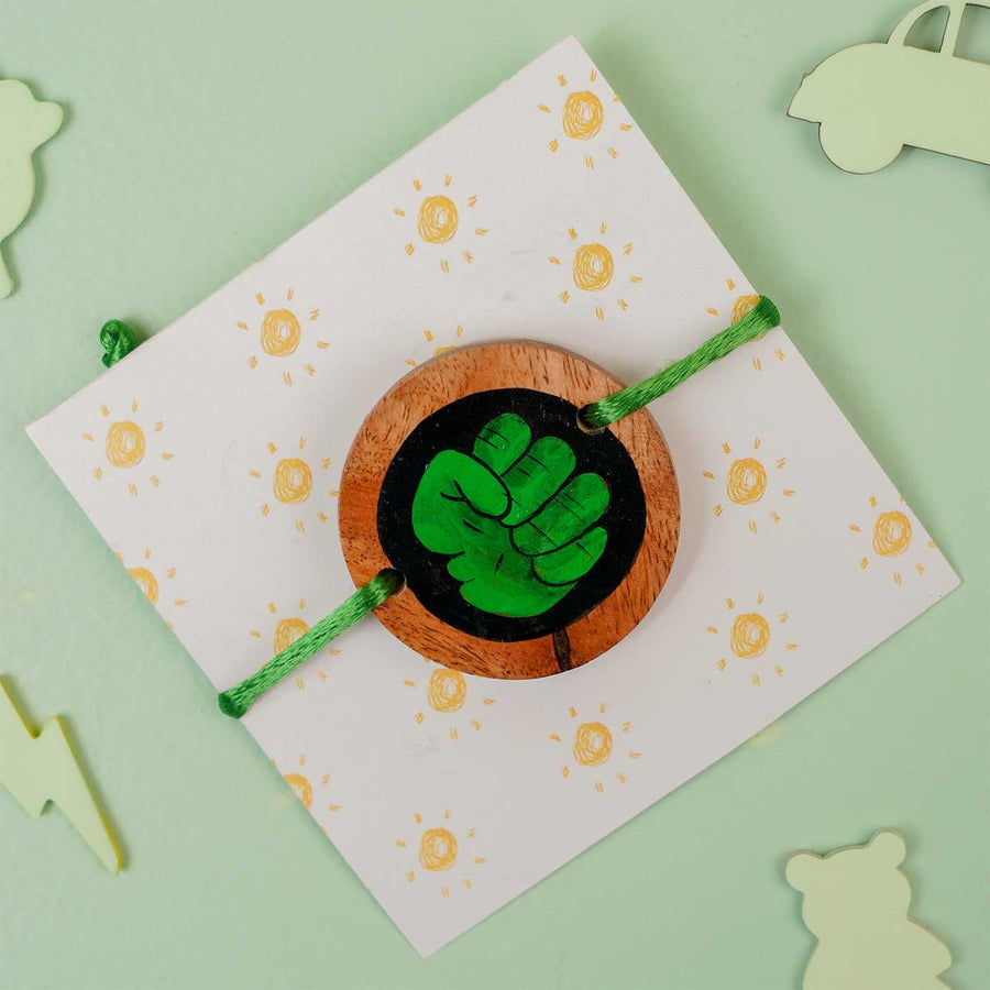 Personalized Hand Painted Hulk Theme Wooden Rakhi With Roli Chawal - Front View on Decorative Card