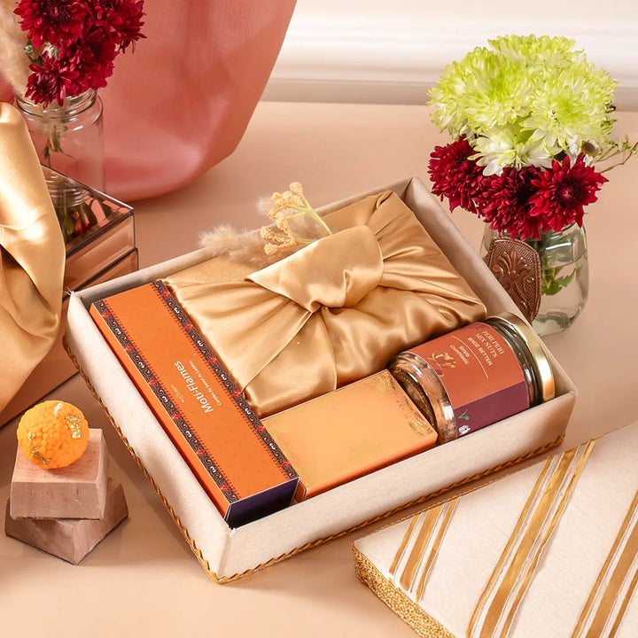 Exquisite Diwali Delights Gift Hamper | Includes 4 Laddoo Candles, 1 Moong Barfi Box, 1 Mix Nuts Jar, 1 Tilak Set, 1 Gift Box