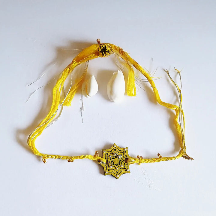 Handmade Yellow Ghungroo Shell & Beads Wooden Lumba Rakhi For Bhabhi With Roli Chawal