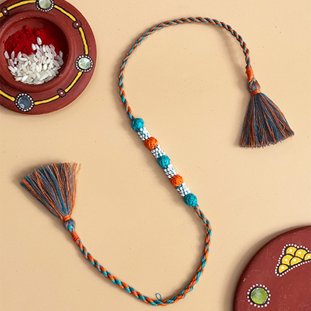 Handmade Reusable Orange And Blue Beaded Patwa Rakhi For Brother