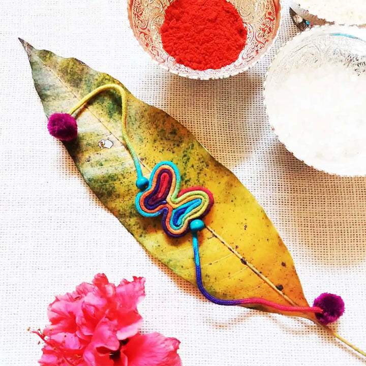 Handmade Dori Work Butterfly Kids Rakhi With Roli Chawal - Styled with Festive Items