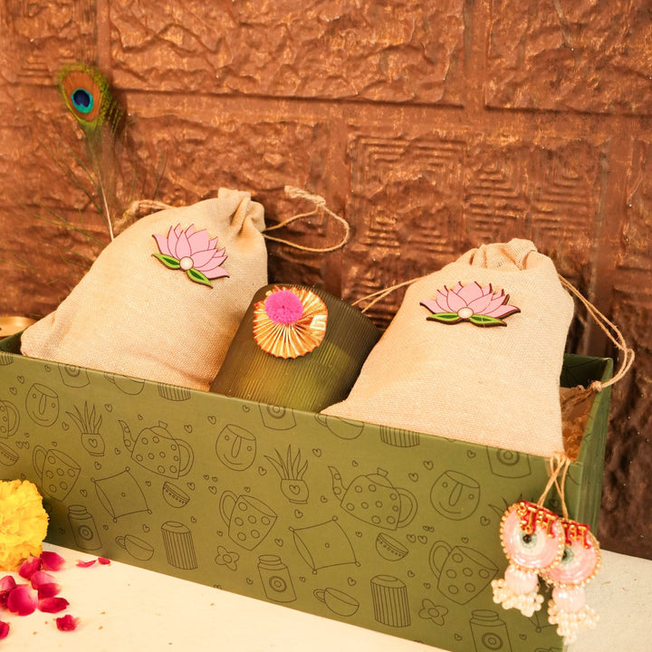 Light & Nourish Diwali Gift Hamper | Includes 2 Dry Fruit Potlis, 2 Hangings, 1 Candle, 1 Mor Pankh, 1 Diwali Card, 1 Gift Box