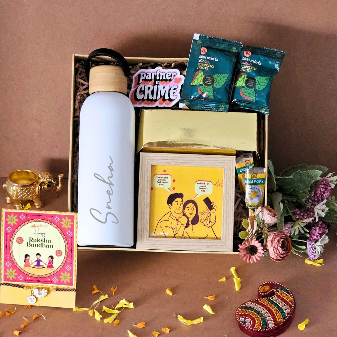 Personalized Bachpan Ki Yaadien Rakhi Hamper | Includes 1 Bottle, 1 Photo Frame, 1 Fridge Magnet, 2 Paan Mints, 1 Dry Fruit Box & 2 Desi Pops