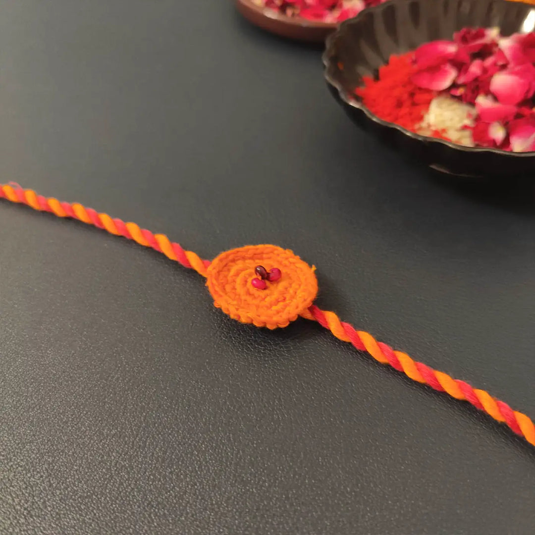 Handmade Crochet Beaded Round Rakhi With Roli Chawal