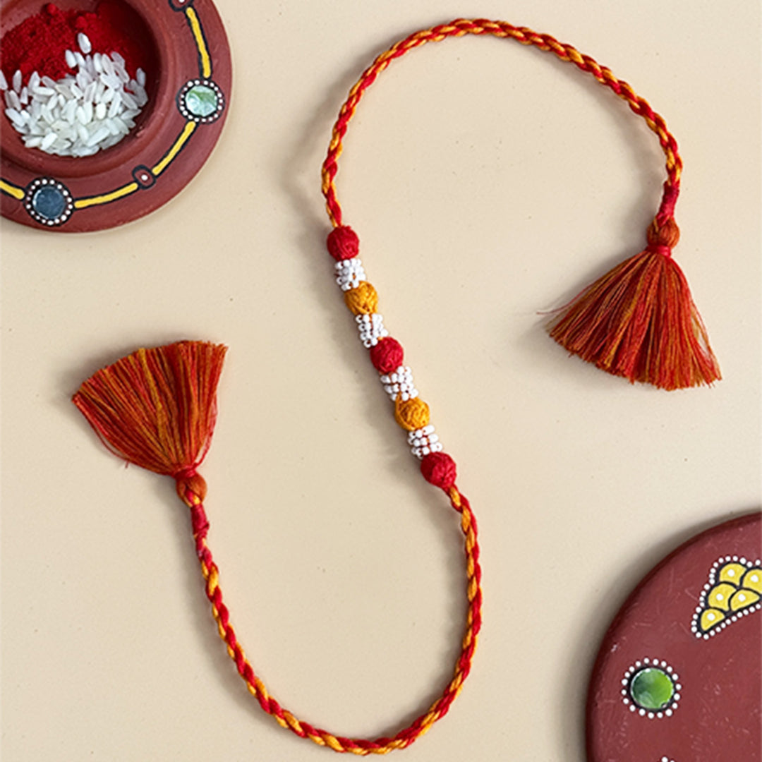 Handmade Reusable Red And Yellow Beaded Patwa Rakhi For Brother