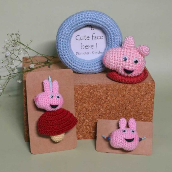 Handmade Crochet Peppa Pig Kids Lumba Rakhi With Roli Chawal - Set Display on Decorative Blocks