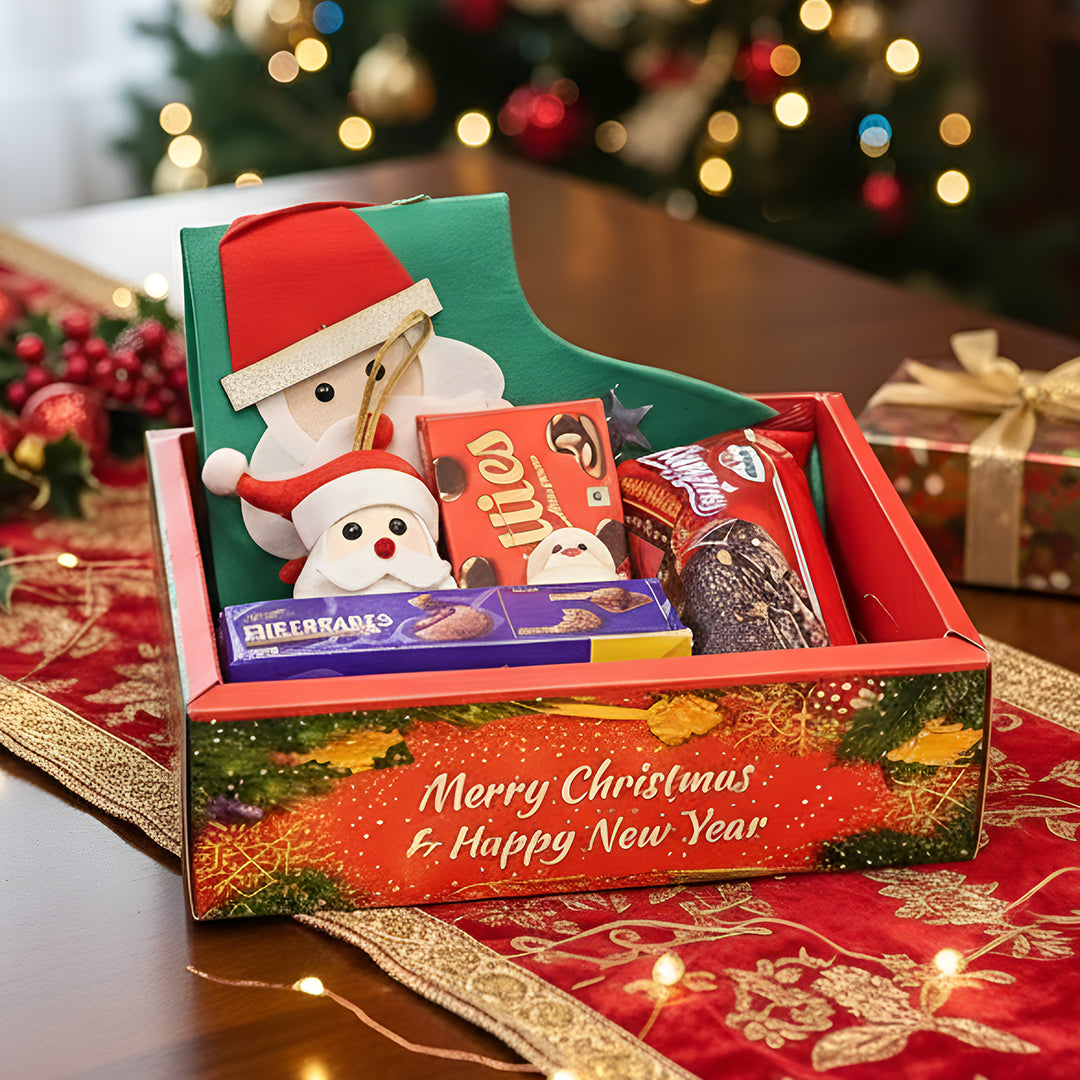Personalized Christmas Gift Hamper | Includes 1 Ornament, 1 Stocking, 1 Santa Candle, 1 Brownie Cake, 1 Cadbury Chocobakes, 1 Nutties Pack