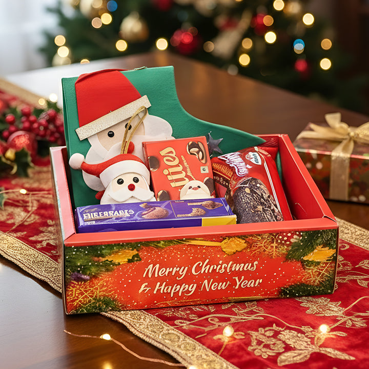 Personalized Christmas Gift Hamper | Includes 1 Ornament, 1 Stocking, 1 Santa Candle, 1 Brownie Cake, 1 Cadbury Chocobakes, 1 Nutties Pack