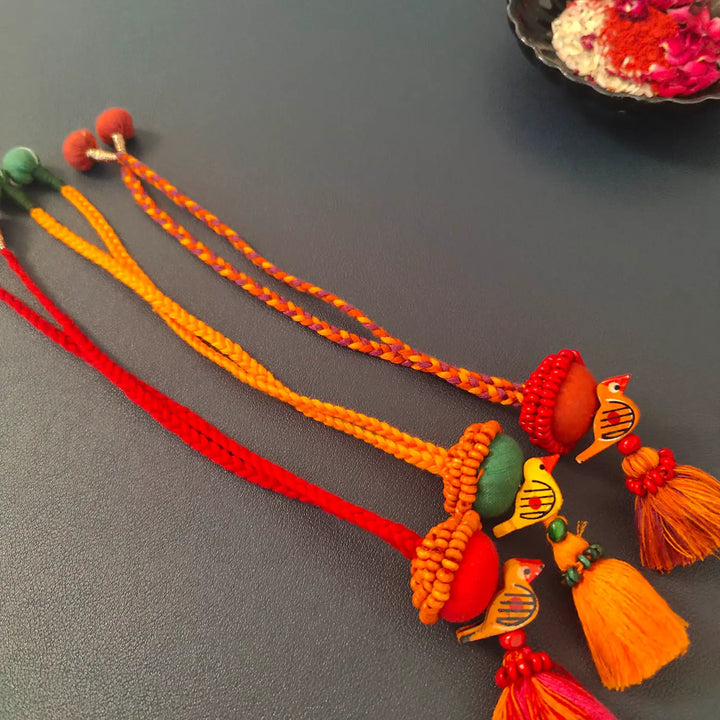 Handmade Beaded Multicolour Bird Lumba Rakhi For Bhabhi With Roli Chawal | Set Of 3
