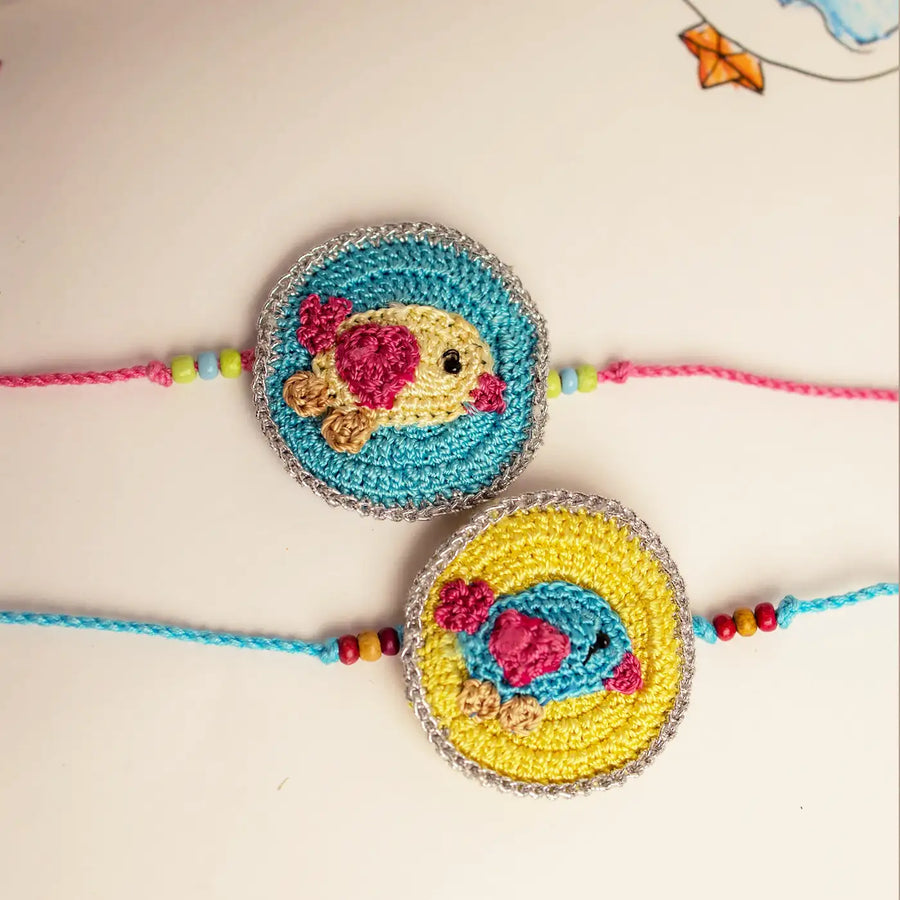 Handmade Crochet Bird Theme Kids Rakhi With Roli Chawal Set Of 2 - Close-up Front View
