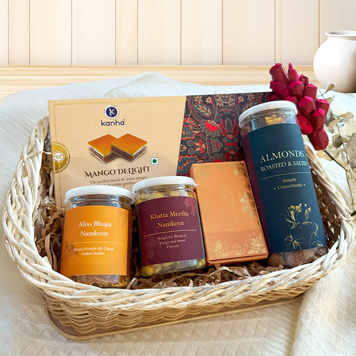 The Celebration Crate Diwali Gift Hamper | Includes 1 Mango Delight Box, 2 Namkeen Jars, 1 Almonds Jar, 1 Tilak Set, 1 Basket
