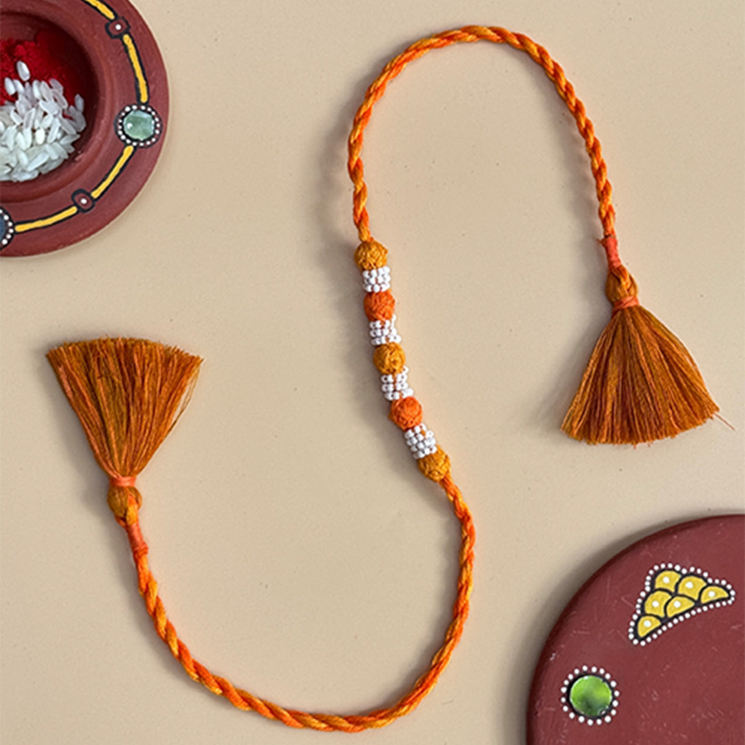 Handmade Reusable Orange And Yellow Beaded Patwa Rakhi For Brother