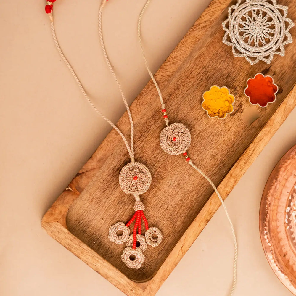 Handmade Crochet Beige Mandala Bhaiya Bhabhi Rakhi With Roli Chawal Set Of 2 - Full Product Top View
