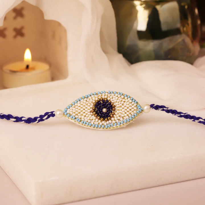 Handmade Beaded Pearl Evil Eye Rakhi With Roli Chawal