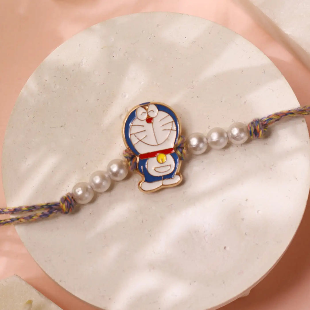 Handmade Doraemon Charm Kids Rakhi With Roli Chawal