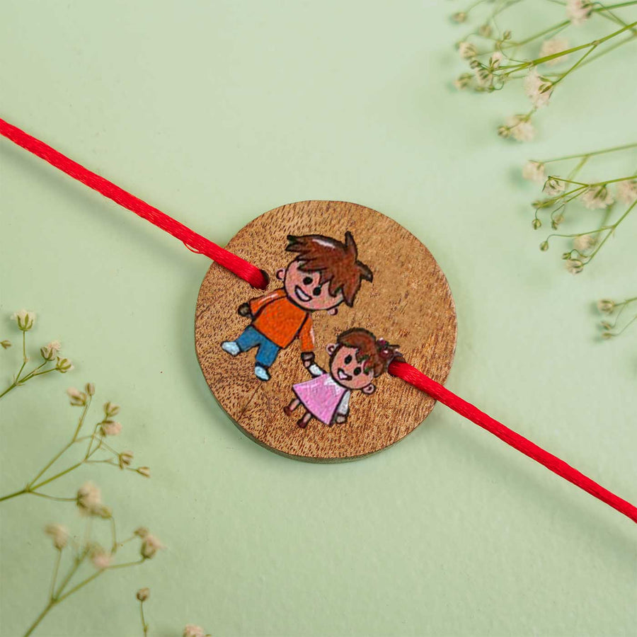 Personalized Hand Painted Bro Sis Wooden Rakhi With Roli Chawal - Close-up of Bracelet Charm