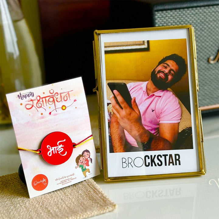Photo Personalized Minimal Design Metal And Glass Rakhi Hamper For Brother Includes 1 Rakhi And Photo Frame - Rakhi and photo frame displayed