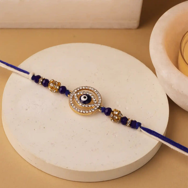 Handmade Round Evil Eye Rakhi With Roli Chawal