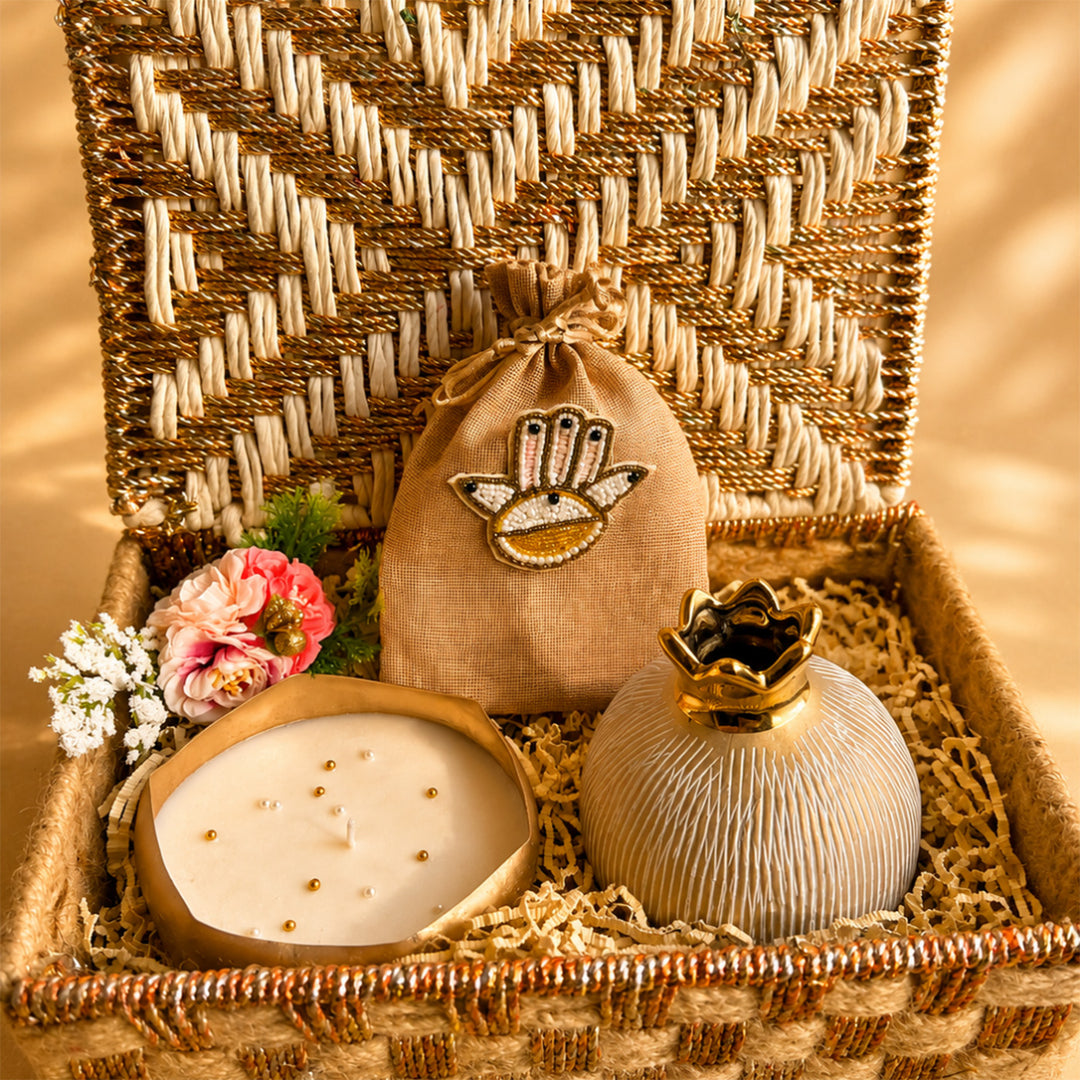 Swarn Utsav White & Gold Basket Diwali Gift Hamper With Urli Candle, Shubh Labh Potli And Pomegranate Vase For Festive Gifting