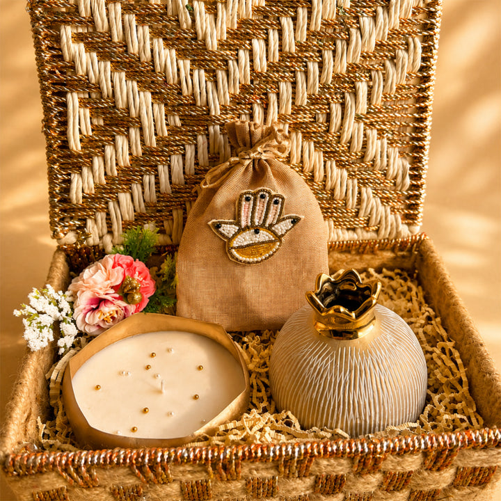 Swarn Utsav White & Gold Basket Diwali Gift Hamper With Urli Candle, Shubh Labh Potli And Pomegranate Vase For Festive Gifting