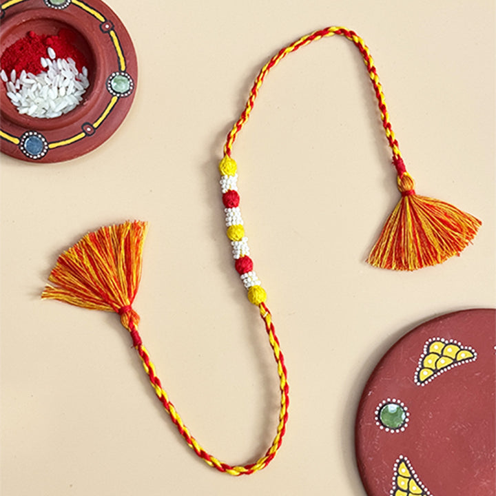 Handmade Reusable Red And Bright Yellow Beaded Patwa Rakhi For Brother
