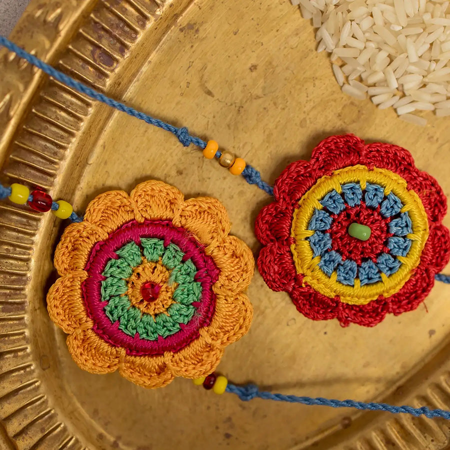 Handmade Crochet Noor Rakhi With Roli Chawal Set Of 2 - Close-up of Crochet Flower Details