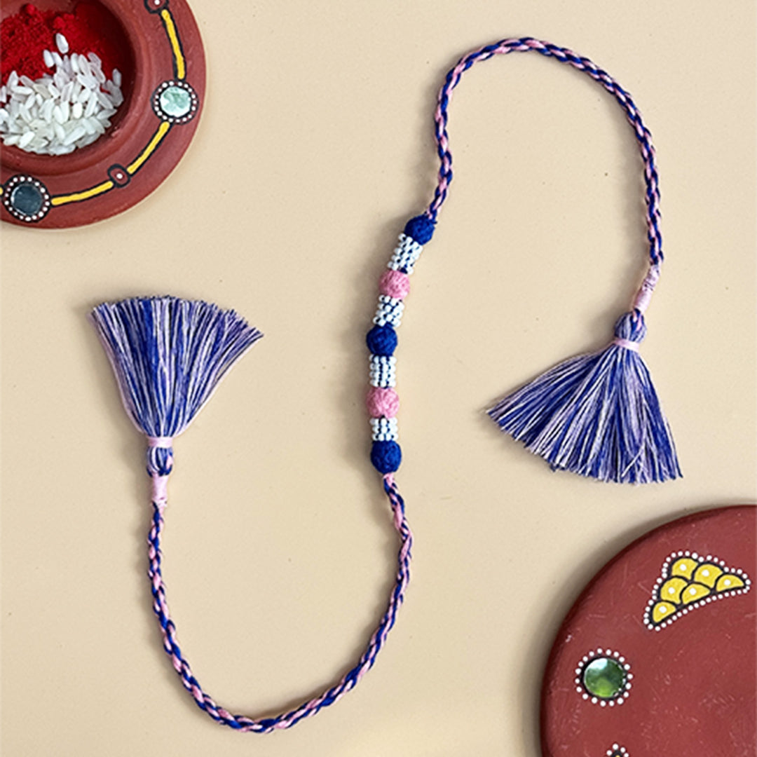 Handmade Reusable Blue And Light Pink Beaded Patwa Rakhi For Brother