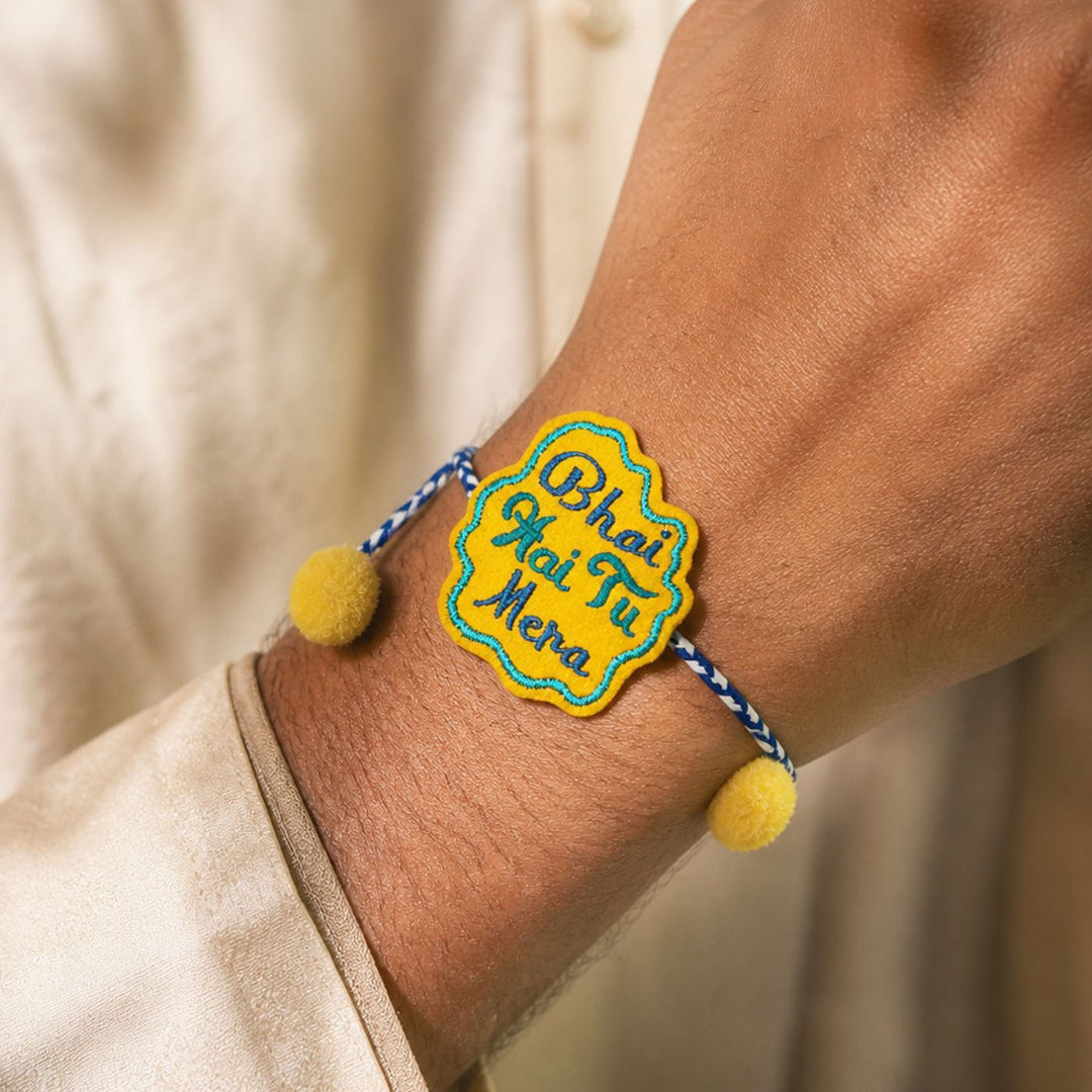 Handmade Reusable "Bhai Hai Tu Mera" Pom - Pom Felt Rakhi For Brother