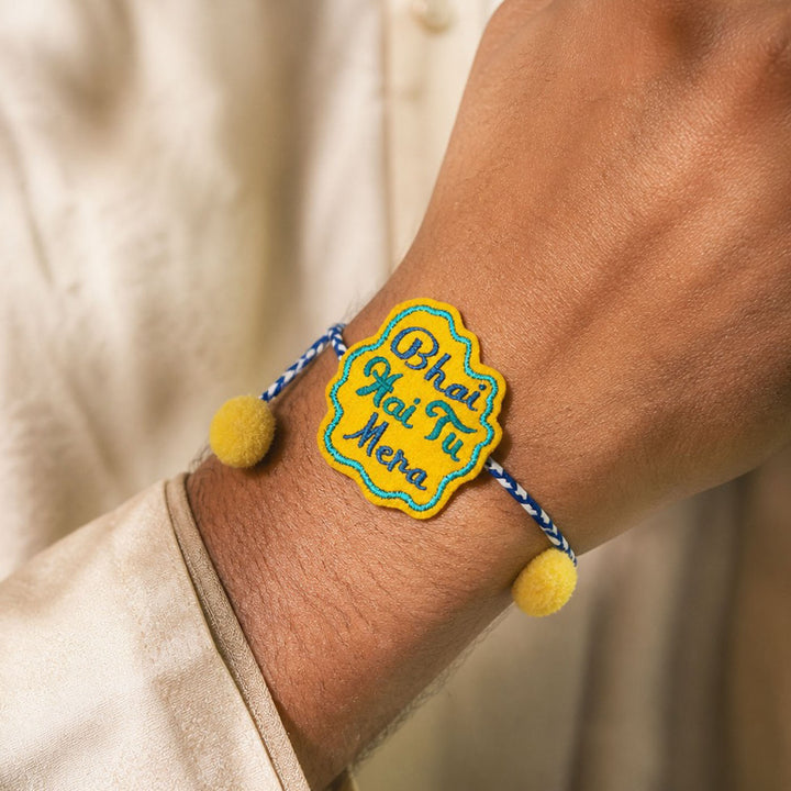 Handmade Reusable "Bhai Hai Tu Mera" Pom - Pom Felt Rakhi For Brother