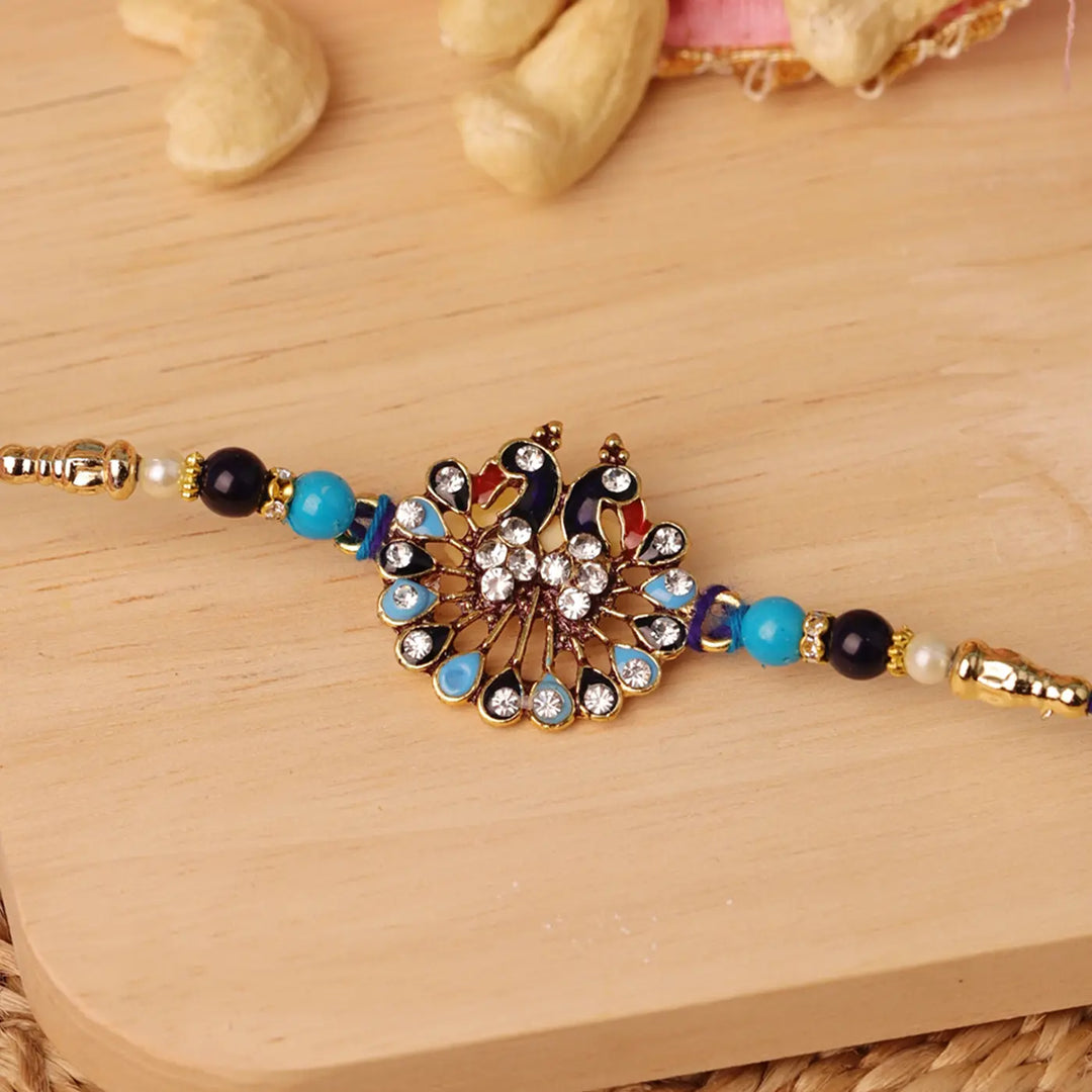 Handmade Stone Embellished Peacock Rakhi With Roli Chawal