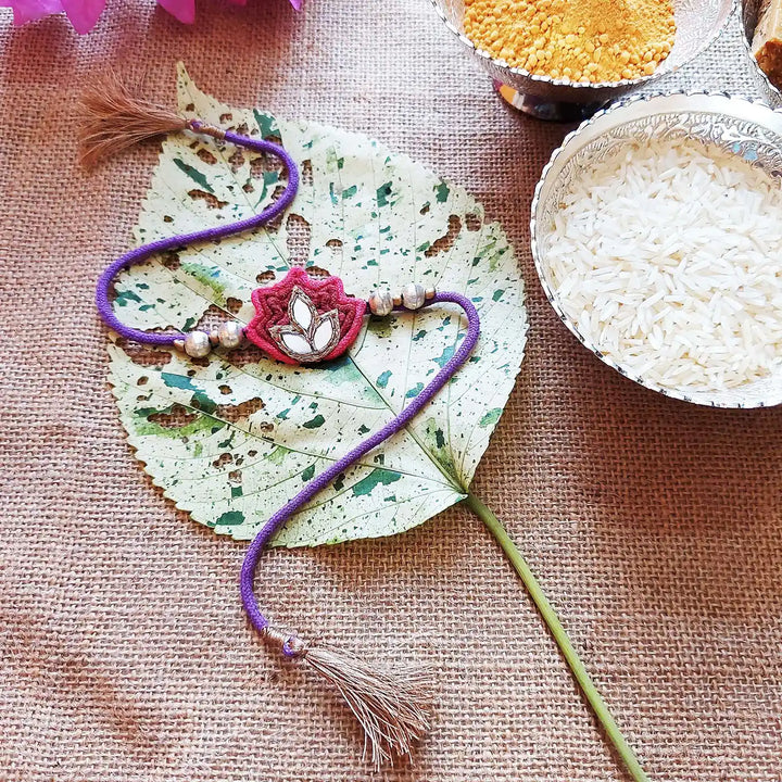 Handmade Mirror Work Lotus Rakhi With Roli Chawal - Styled with Leaf and Bowls