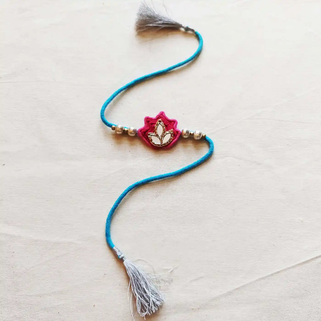 Handmade Mirror Work Lotus Rakhi With Roli Chawal - Full Length with Tassel Detail