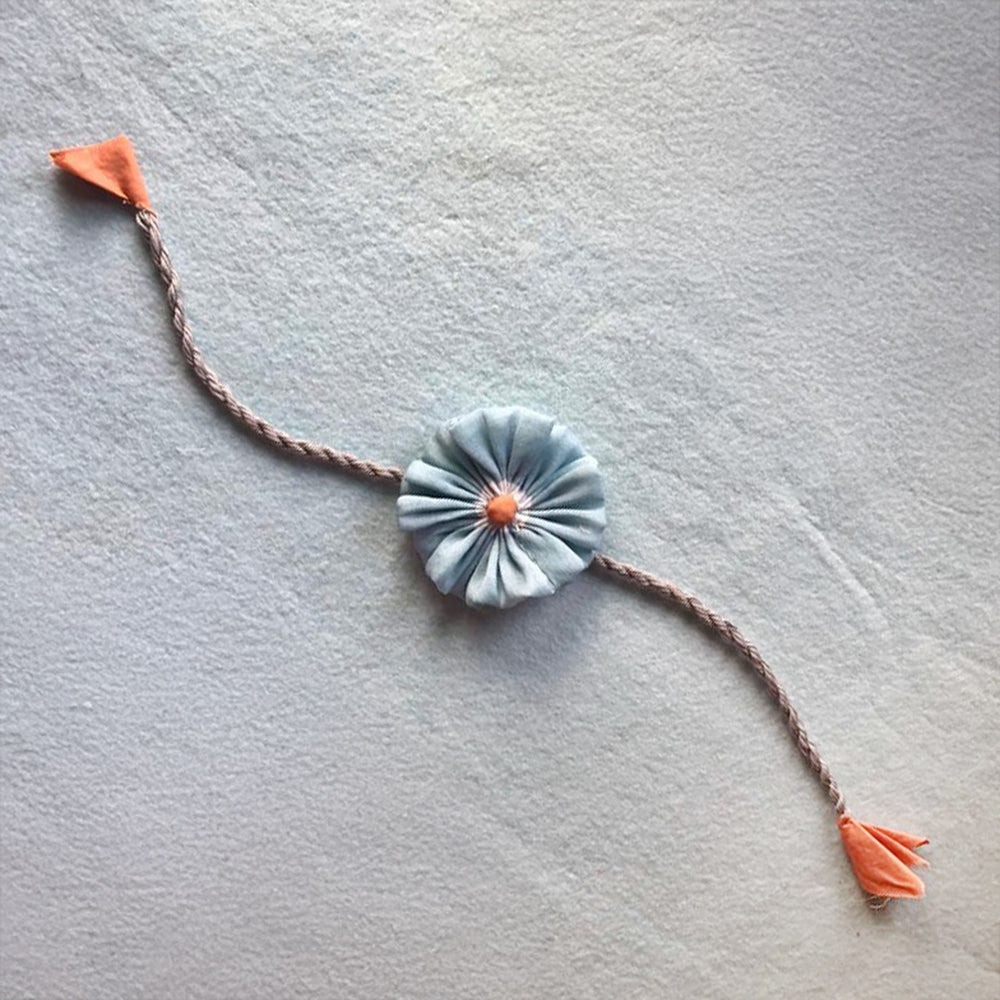 Handmade Beaded Daisy Flower Design Upcycled Fabric Rakhi With Roli Chawal For Brother - Single Floral Knot Band Front View