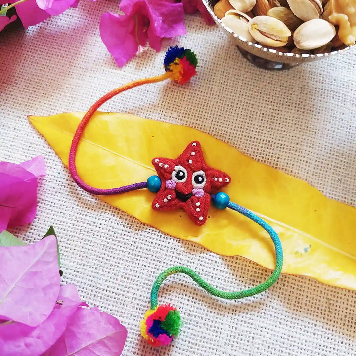 Handmade Dori Work Starfish Kids Rakhi With Roli Chawal - Styled with Decorative Elements