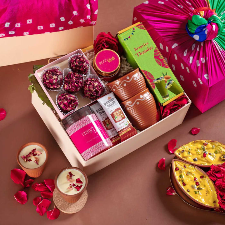 Sweet Hues of Holi Gift Hamper | Includes 1 Thandai, 2 Paper Boat Chikkis, 1 Pink Gulaal, 1 Rose Mishri, 1 Rose Dry Petals Laddoo Box, 2 Kulhads, 1 Classic Gift Box