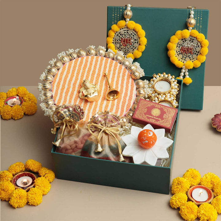 Handmade Shagun Gift Hamper | Includes 1 Lotus, 2 Tea Light Holder, 1 Pooja Thali, 2 Dry Fruit, 1 Bell, 1 Kumkum Chawal, 1 Shubh Labh, 1 Ganesh, 1 Card And 1 Box