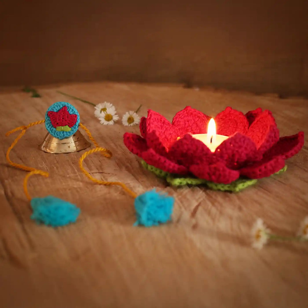 Handmade Crochet Lotus Rakhi And Tealight Holder Combo With Roli Chawal Set Of 2 - Flower as Candle Holder with Lit Candle