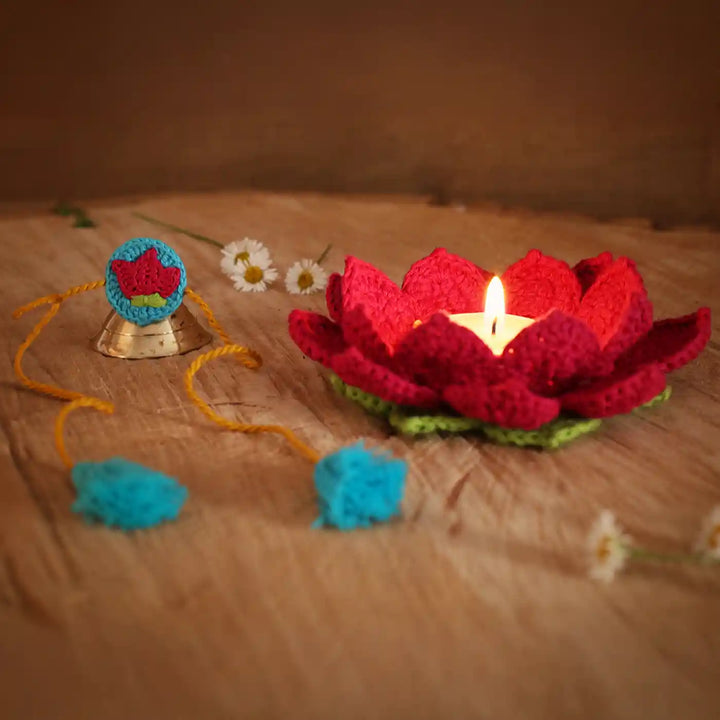 Handmade Crochet Lotus Rakhi And Tealight Holder Combo With Roli Chawal Set Of 2 - Flower as Candle Holder with Lit Candle