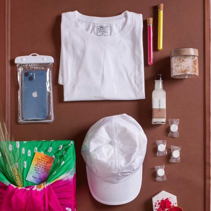 Holi Care Kit | Includes 1 White Cap, 1 White T-Shirt, 1 Bath Salt Jar, 1 Coconut Oil, 1 Waterproof Pouch, 2 Organic Colors in Test Tubes, 4 Face Masks, 1 Gift Box