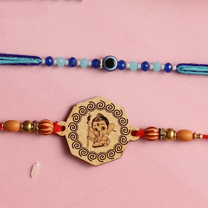 Handmade Bal Ganesh & Evil Eye Kids Rakhi With Roli Chawal | Set Of 2