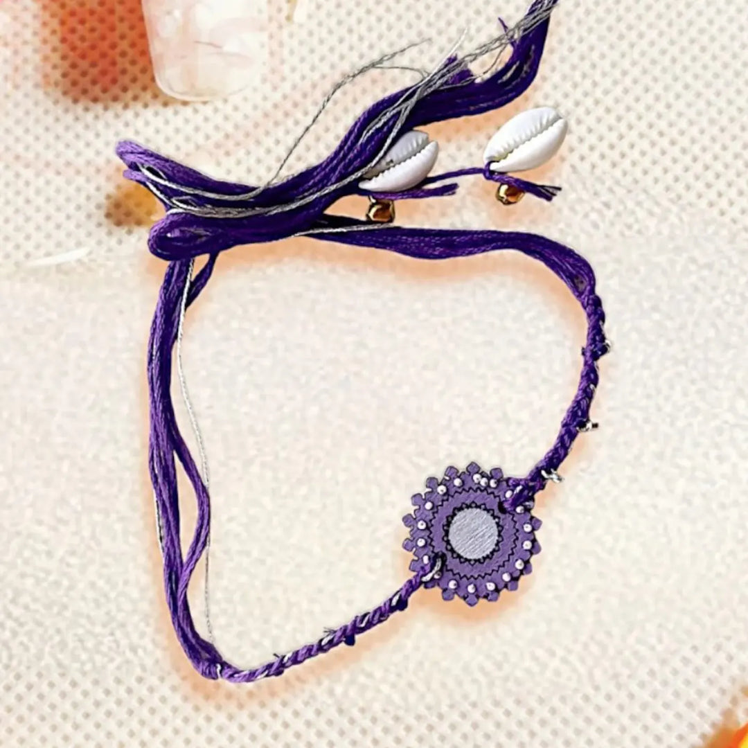 Handmade Purple Ghungroo, Shell & Beads Wooden Lumba Rakhi For Bhabhi With Roli Chawal