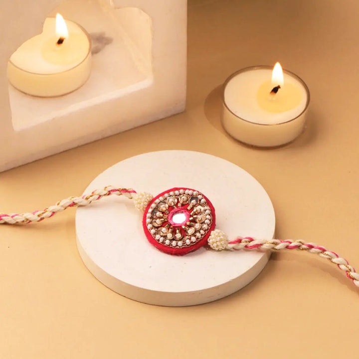 Handmade Beaded Round Pink Rakhi With Roli Chawal