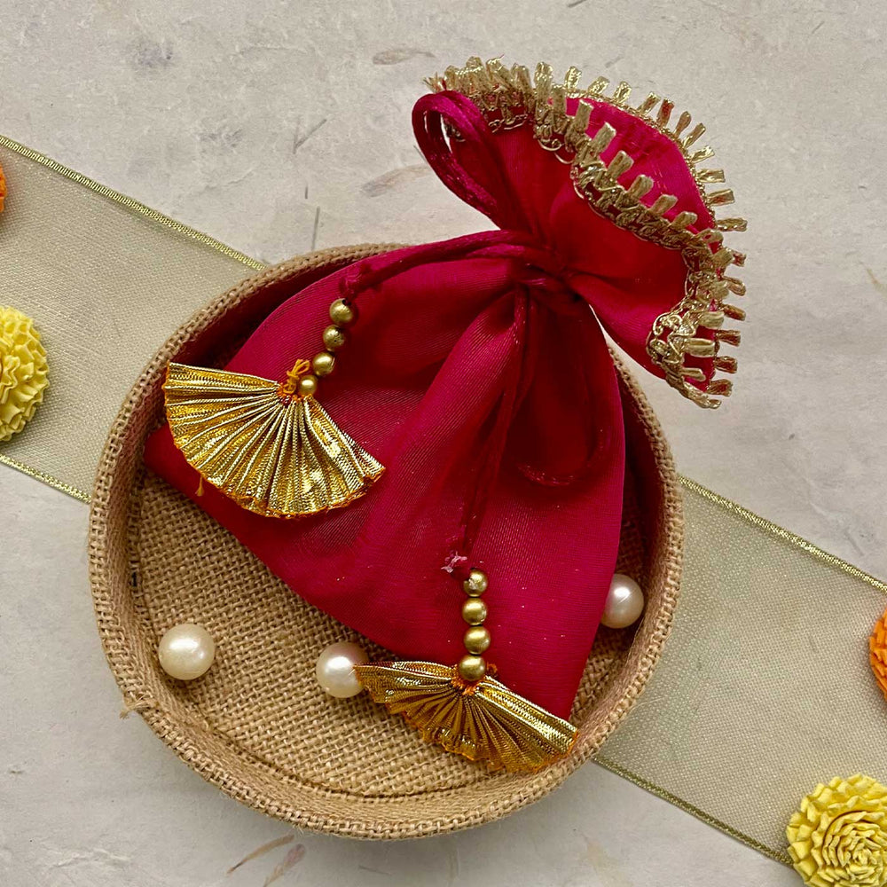 Handmade Sacred Threads Rakhi Hamper Includes 1 Marble Lotus 1 Tilak Bowl 1 Roli Chawal 1 Pooja Thali And 1 Set Bhaiya Bhabhi Rakhi - Decorative pouch in basket