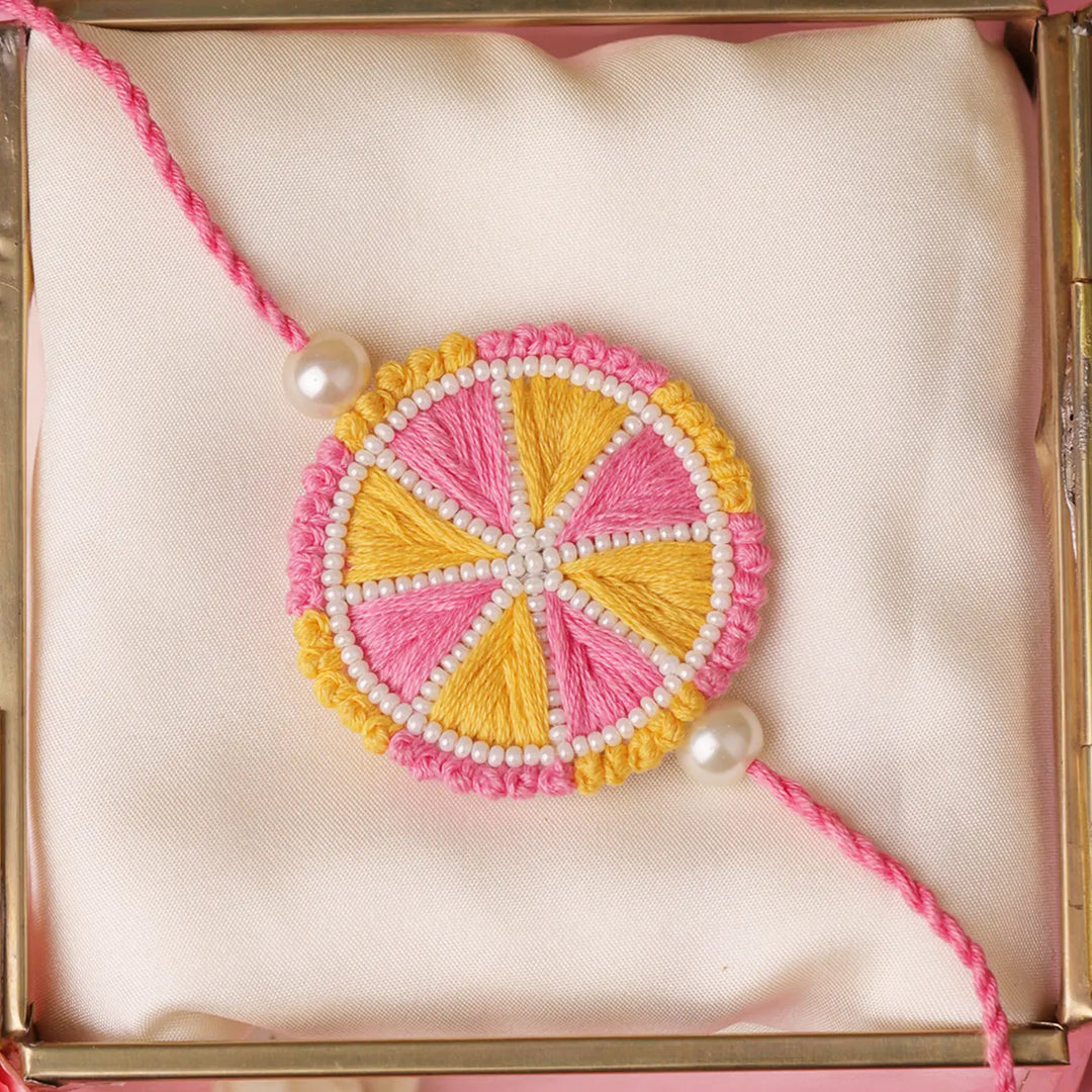 Handmade Embroidered Pink & Yellow Rakhi With Roli Chawal
