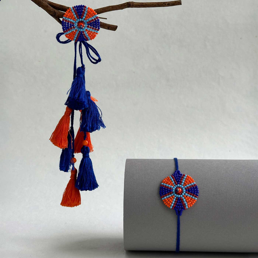 Customized Handmade Beaded Chakri Design Lumba Rakhi For Bhabhi With Roli Chawal - Hanging with Tassels and Rolled Display