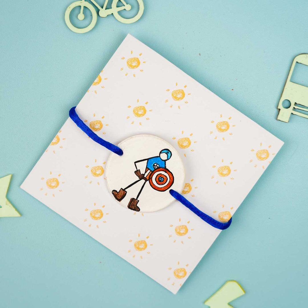 Personalized Hand Painted Captain America Clay Rakhi With Roli Chawal - Front View on Card
