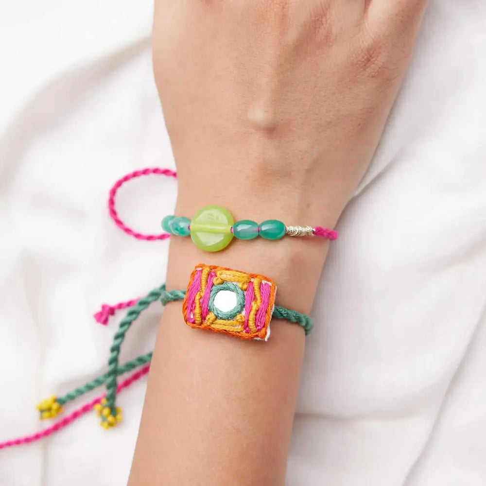 Handmade Beaded And Mirror Work Litchi Rakhi With Roli Chawal Set Of 2 - Wrist Wearing Two Bracelets