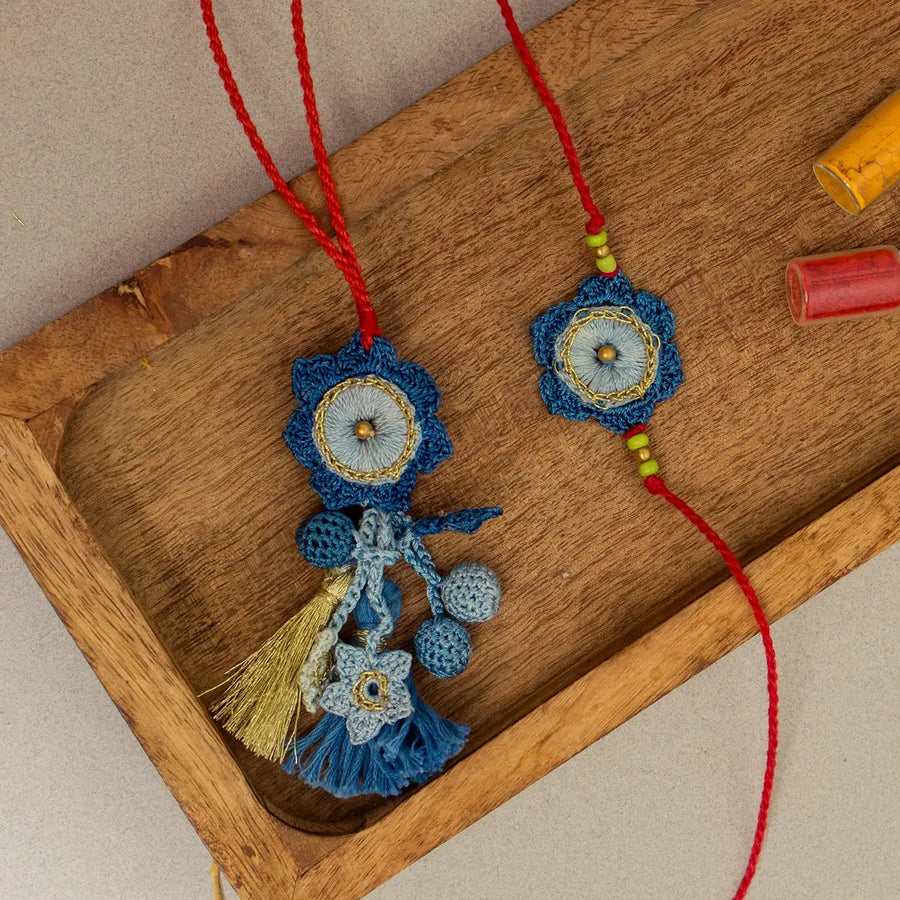 Handmade Crochet Neelkamal Bhaiya Bhabhi Rakhi With Roli Chawal Set Of 2 - Close-up on Tray