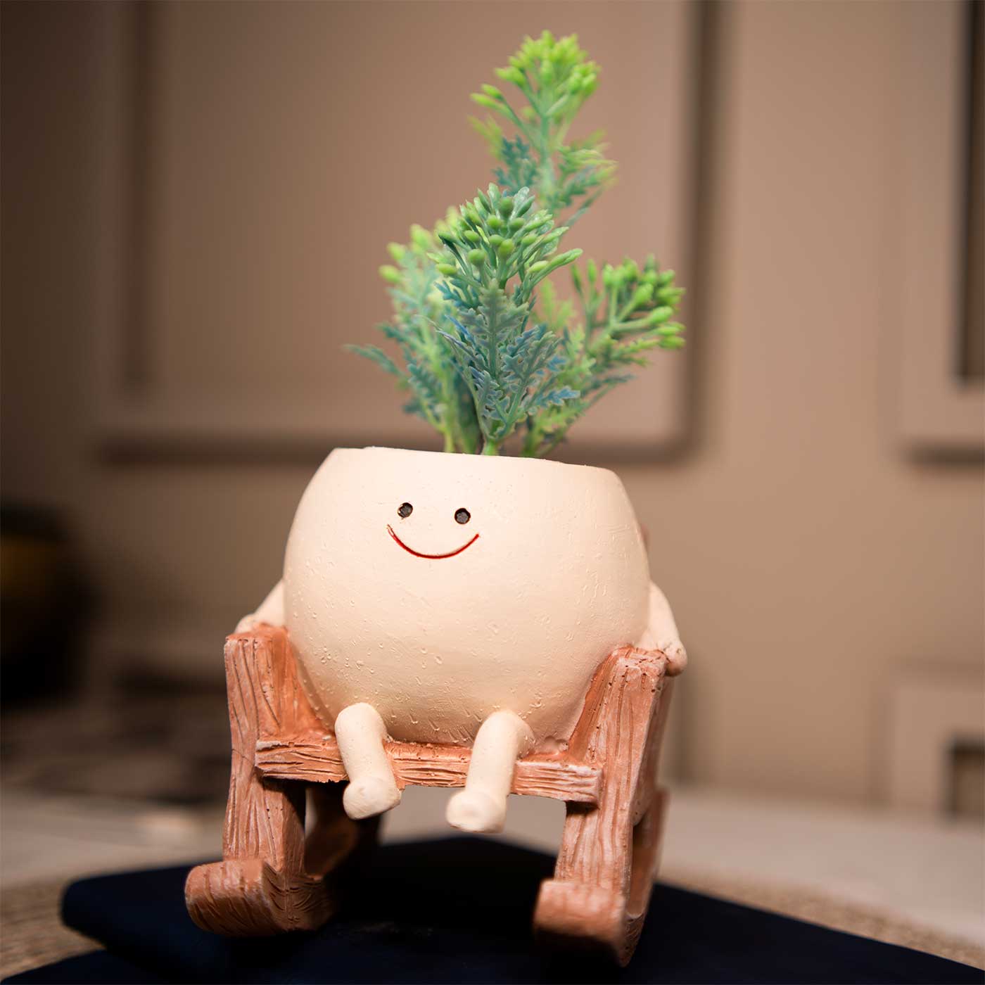 Buy Smiley Resin Planter On Rocking Chair Online On Zwende